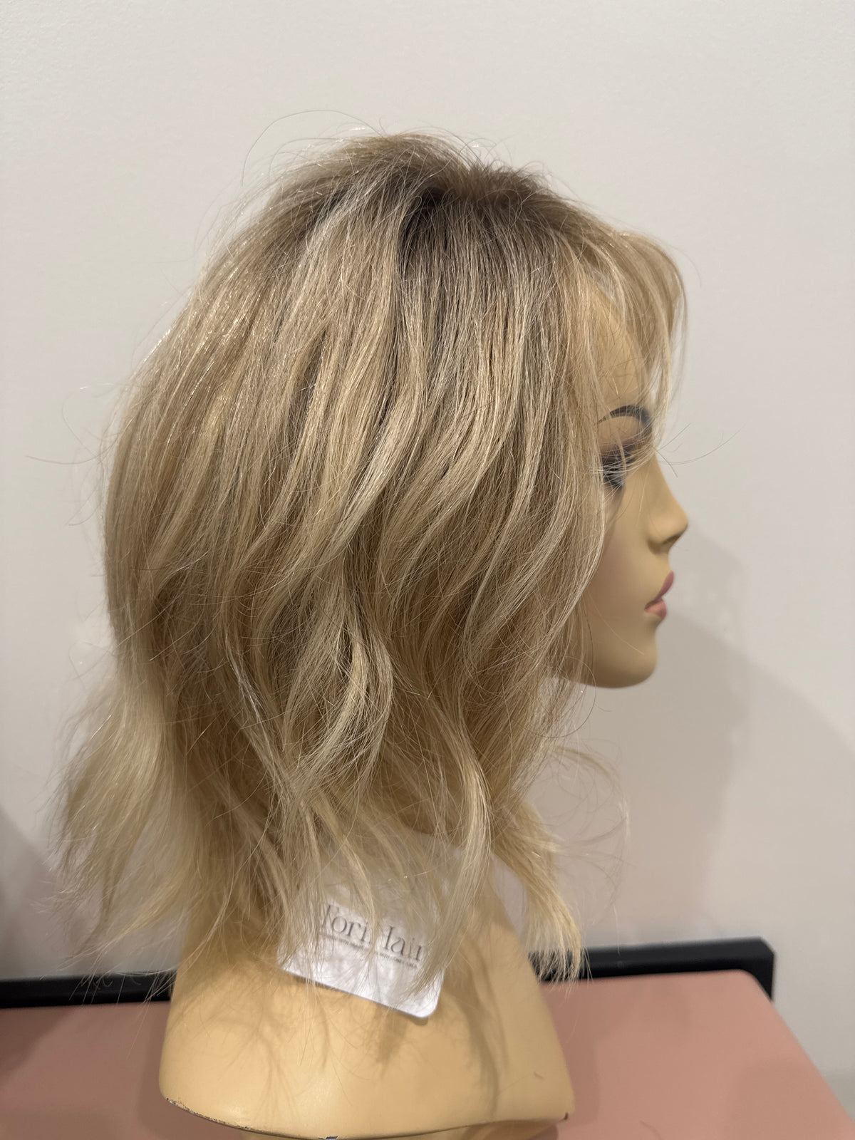 Napa Light blonde rooted with highlights